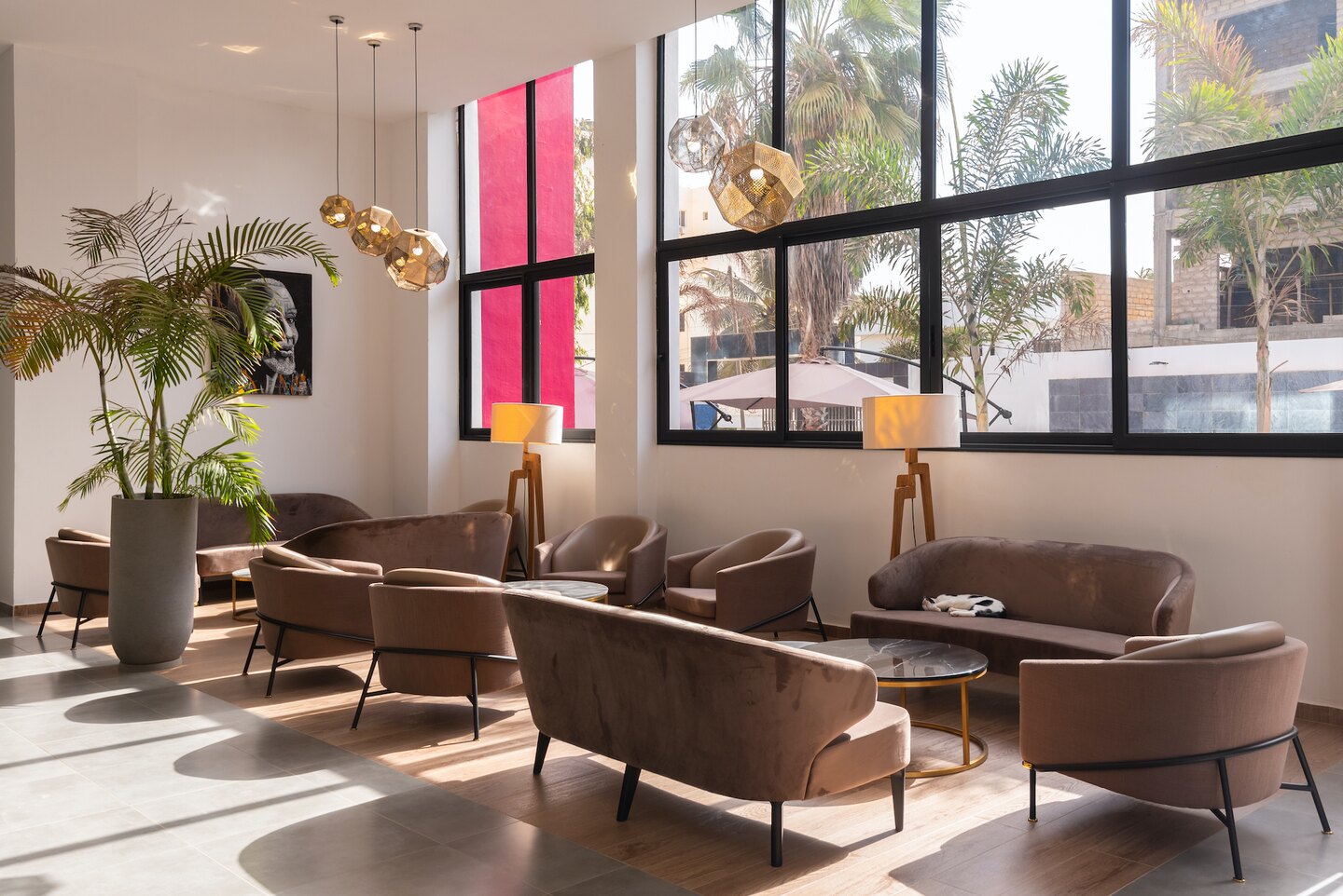 Bright lounge in the lobby of L’Adresse Dakar
